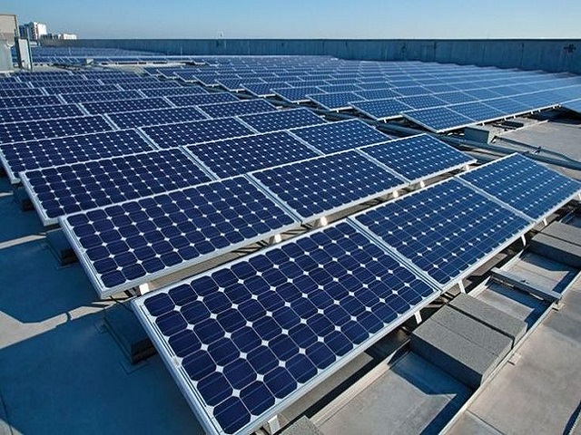 A commercial rooftop solar array installed on a building in Kenya