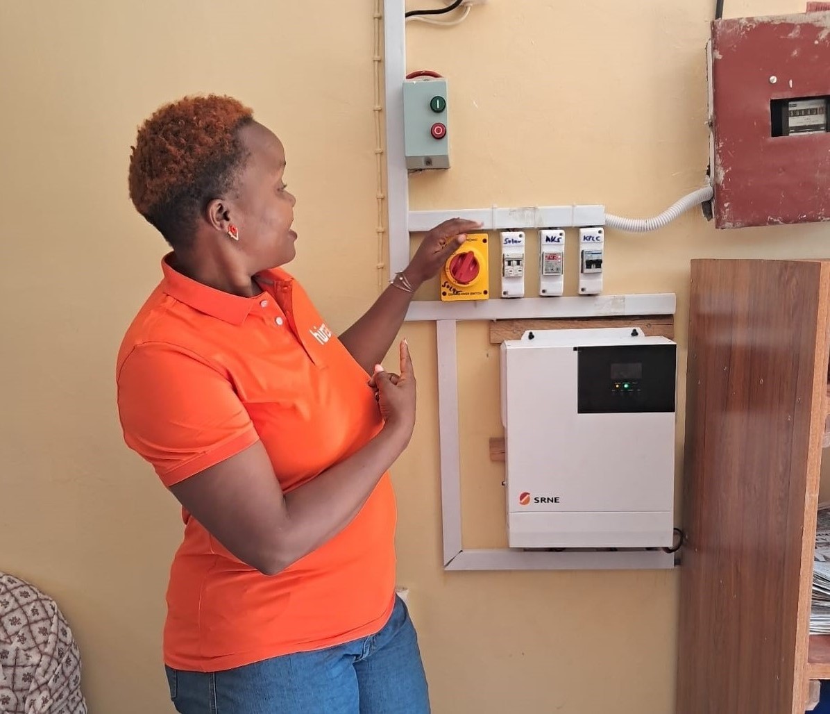 A hybrid inverter being commissioned in a home